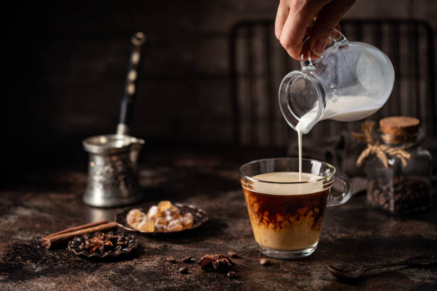 istock Coffee in a glass with cream 1429744372