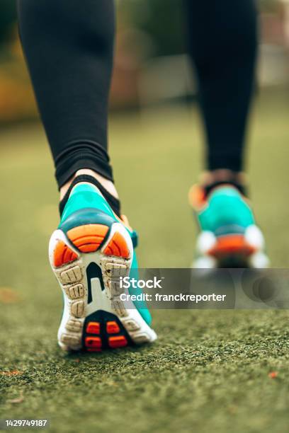 Rear View Of Woman Shoes Running Stock Photo - Download Image Now - Outdoors, Sports Shoe, Walking