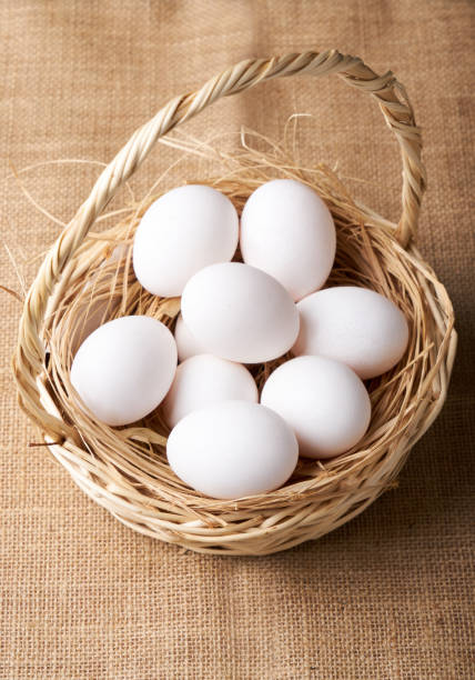 istock eggs in a basket on a brown mesh background 1429749625