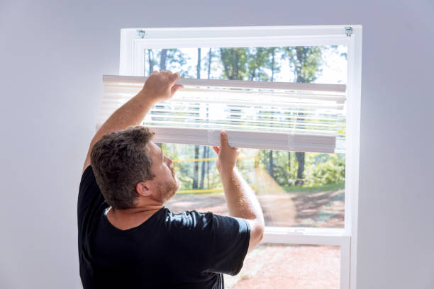 istock In a newly constructed house, a contractor is installing window blinds 1429769127