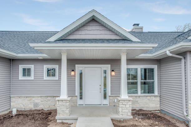 istock Modest front entry of new home 1429770439