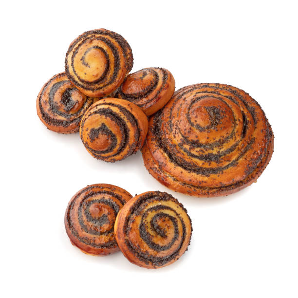freshly baked poppy seed bun isolated on white background, top view