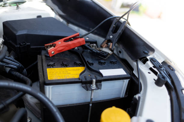 istock Jumper Cables Connected to Car Battery 1429790181