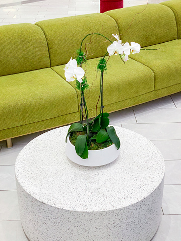 Artificial flower lily. Decoration of the building and offices. Spa . Flower sprig