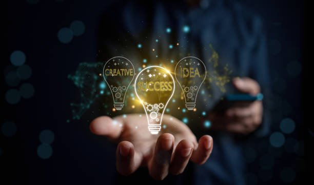 istock Great inspiration and innovation new beginning. creative smart thinking ideas and innovation. Businessman holding virtual lightbulb for presenting new ideas concept. 1429811705