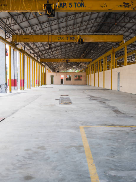 istock Electric crane hook handling transport factory. old 1429837599