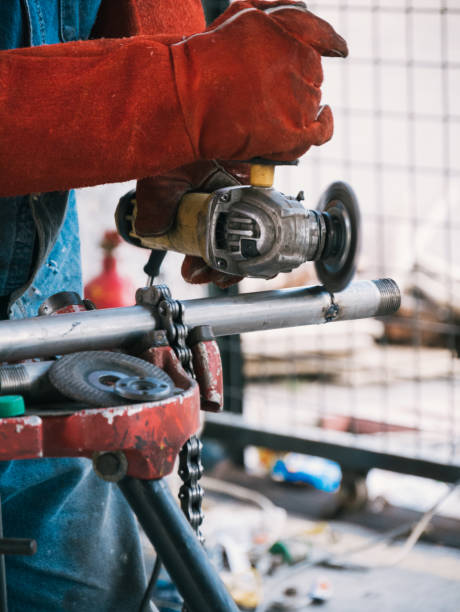 istock Iron soldering, Man working on iron soldering, welding sparks 1429839553