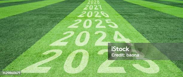New Year Number Of 2023 And 2024 To 2028 Soccer Field Stock Photo - Download Image Now