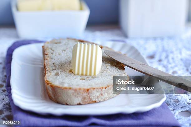 Bread And Butter With A Wooden Knife For Breakfast Stock Photo - Download Image Now - Butter, Fermenting, Buttering