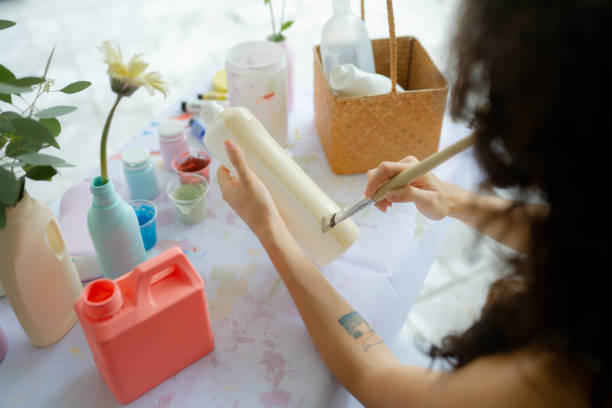 Make a flower vase at home with recycle plastic bottles.