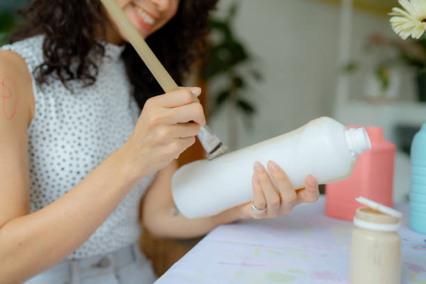 istock Make a flower vase at home with recycle plastic bottles. 1429873448