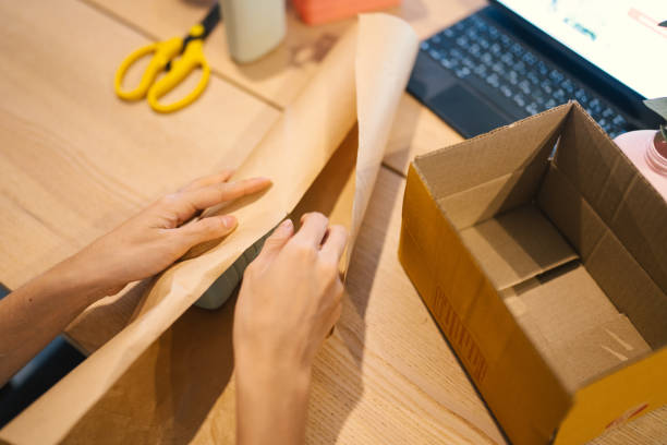 istock Female entrepreneur preparing the shipment for delivery. 1429873869