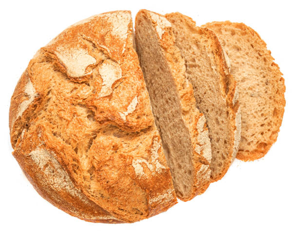 istock Bread loaf with bread  slices viewed from above isolated on white background. Top view. Flat lay. 1429876749