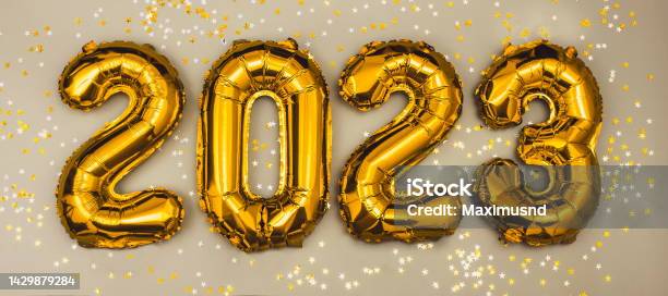 Happy New Year 2023 Celebration Foil Balloons Numeral 2023 And With Glitter Stars Flat Lay Stock Photo - Download Image Now