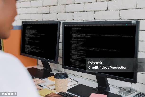 Programmer Stock Programmer Working In Office Coding Stock Photo - Download Image Now ...