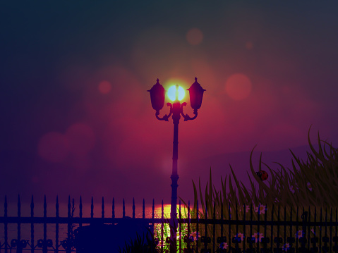 a lamppost under the sun during sunset