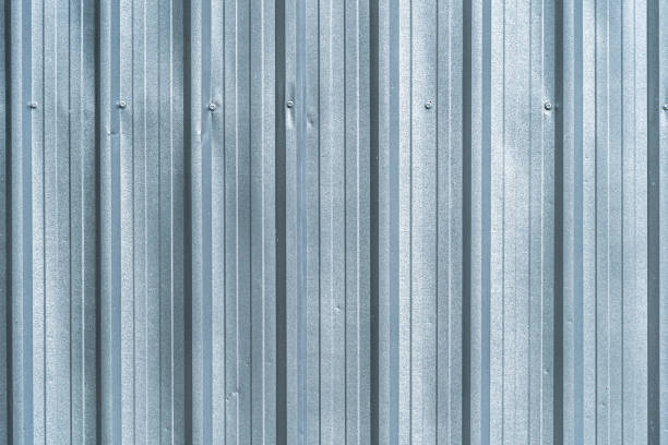 istock White old corrugated metal texture surface sheet for industrial building background 1429898528