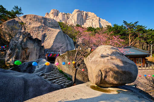 Seoraksan, South Korea - April 15, 2017: Kyejoam Seokgul Hermitage shrine and Ulsanbawi rock in Seoroksan National park, South Korea