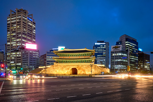 Seoul, South Korea - April 1, 2016 : Namdaemun Gate Sungnyemun at night with city traffic, Seoul, South Korea