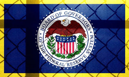 Backlight Backlight with actual Federal Reserve System logo and barbed wire. Prison concept with border image. Double exposure hologram.