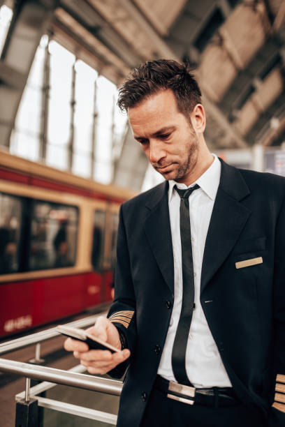 istock pilot on the phone in the city 1429916601