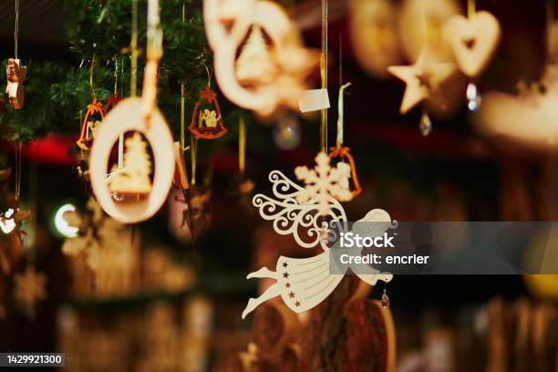 Wooden Angel Decoration On Christmas Market Stock Photo - Download Image Now - Christmas Market, Wood - Material, Angel