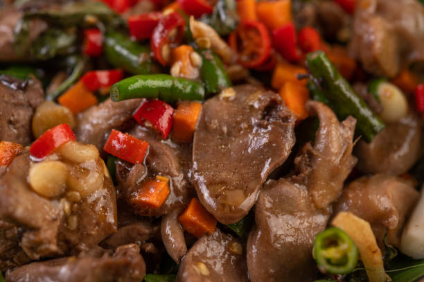 istock Stir-fried chicken liver basil on banana leaves in a black dish 1429921324