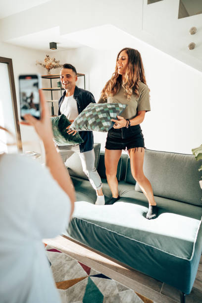 istock friends dancing in the sofa 1429921715