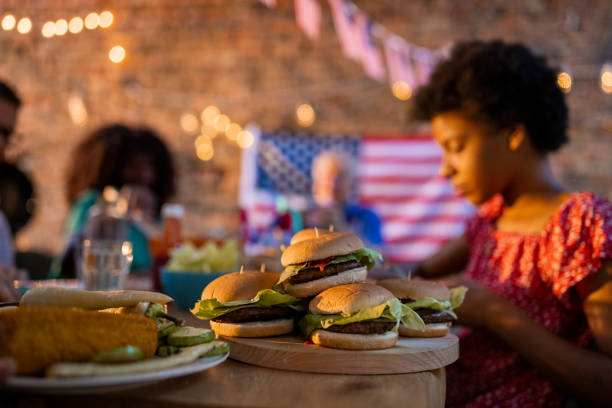 istock Hamburgers on a dinner table where a family is eating dinner 1429927535
