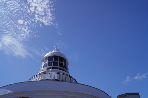 Mihonoseki Lighthouse at the eastern tip of Shimane Peninsula.\nA white lighthouse built on a cliff.