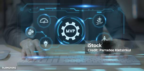 Mvp Minimum Viable Product Concept For Lean Startup New Product Release Planning Analysis And Market Validation Working On Computer With Mvp And Learn Build Measure Icons On Smart Background Stock Photo - Download Image Now