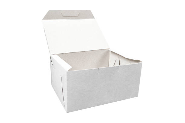 Side view white empty disposable paper fast food tray isolated on white background. Paper box isolated. Paper container stock photo