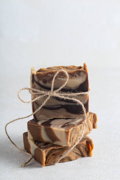 istock Natural handicraft brown soap bars on white background 1429931286