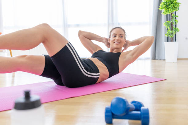 istock Woman working out at home 1429937964