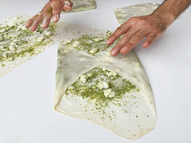istock Chef making traditional Turkish dessert baklava katmer 1429939436