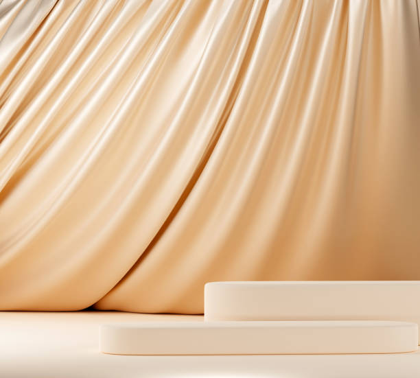 istock Beige pastel podium with beige flying fabric, cloth background 1429948275