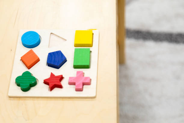 istock Wooden board with colorful shapes 1429949865
