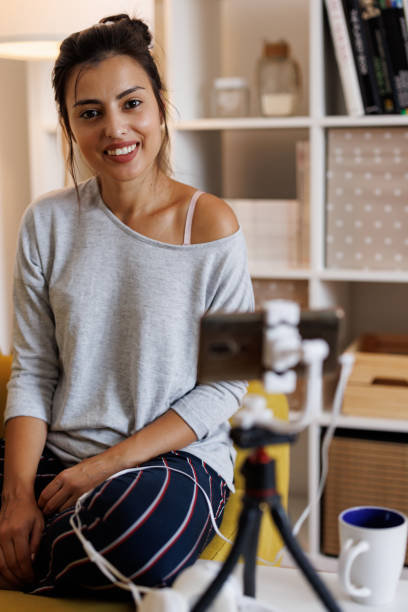 istock Portrait of young female vlogger at home 1429953411