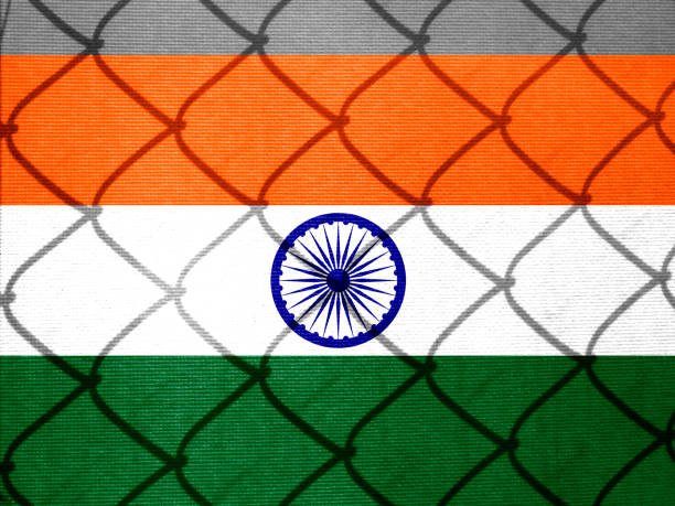 istock Backlight Backlight with actual Indian flag and barbed wire. Prison concept with border image. Double exposure hologram 1429964477