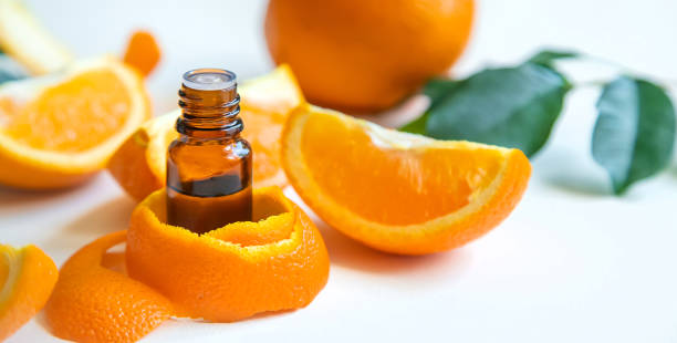 istock Orange essential oil in a small bottle. Selective focus. 1429964496