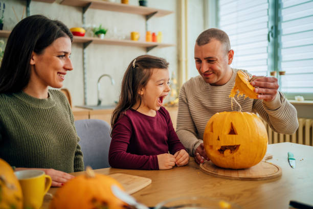 istock Family preparing decorations for Halloween 1429965559