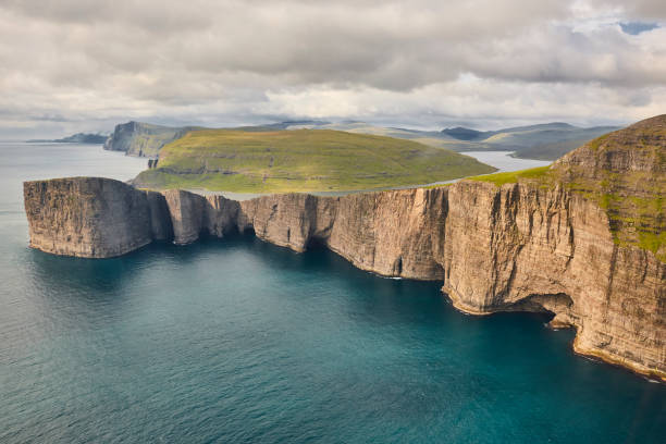 istock Faroe islands dramatic coastline in Vagar. Leitisvatn lake 1429966484