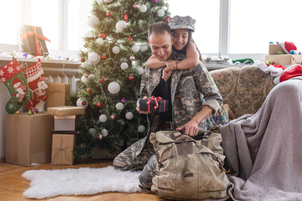istock military with daughter at christmas 1429967359
