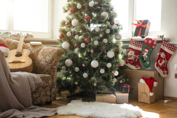 istock Beautiful decorated Christmas tree, socks at cottage 1429972981