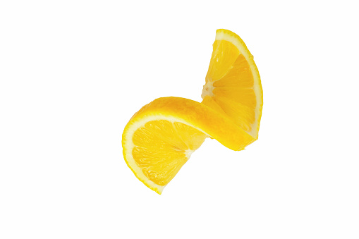 fresh twisted lemon slices isolated on white background