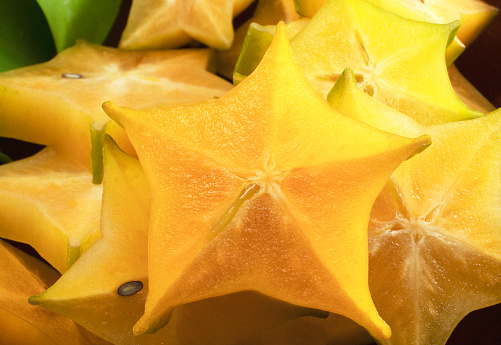 Star fruit or carambola Sliced ripe star mimosa or star apple on white background  is native to Southeast Asia