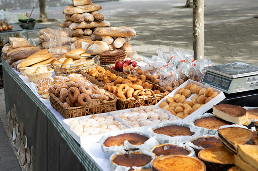 Bakery table at an outdoor farmers market at Plaza del Solar, Portugalete near Bilbao, Spain