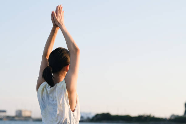 istock Meditating young woman 1429975587