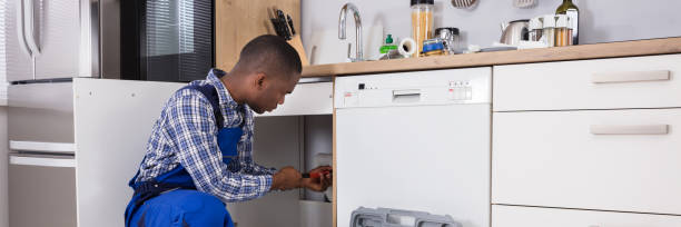 istock Male Plumber Fixing Sink Pipe 1429976591