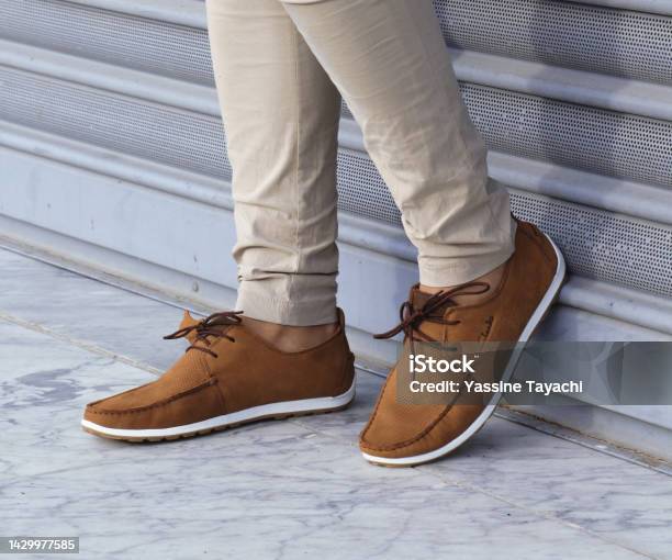 Casual Man Brown Loafer Shoes Posing In The Urban Street Stock Photo - Download Image Now